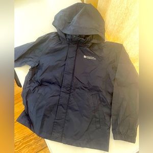 Boys size 7-8. Raincoat.  In great condition.  Color Navy Blue